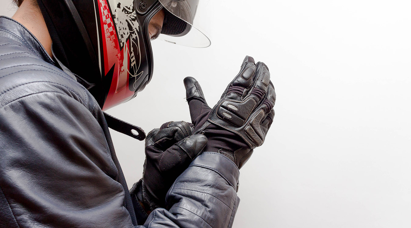 Motorcycle Guy Wearing Helmet and Leather Jacket