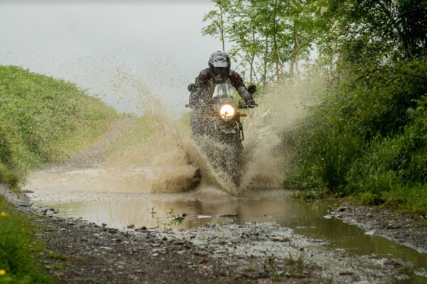 riding motorcycle through mud